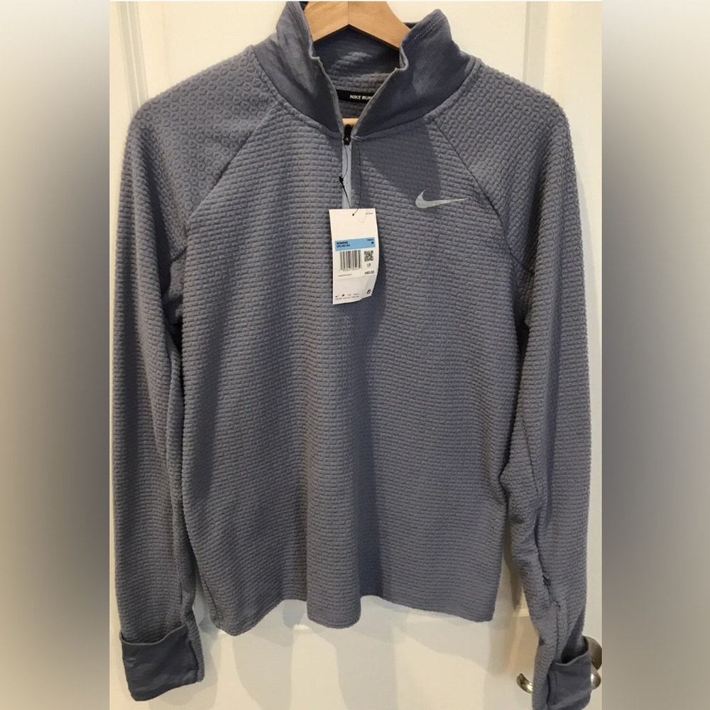 NWT Nike Women Running Long Sleeve Shirt. DRI FIT faint purple color. Size- M